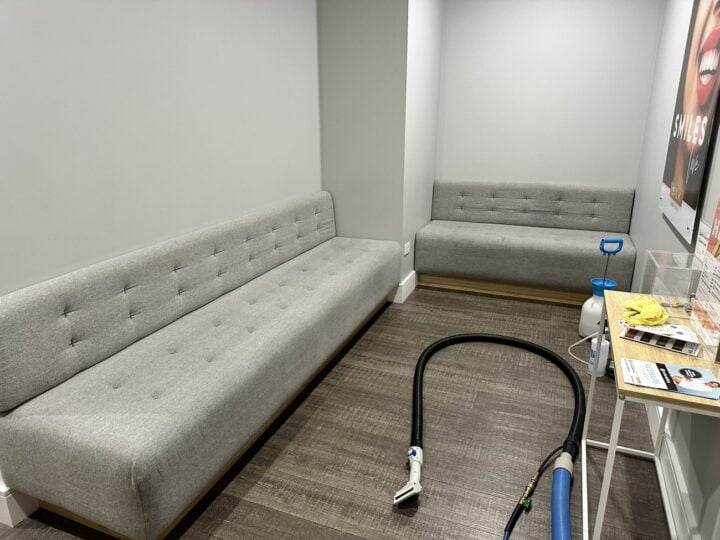 Steam cleaning waiting room couch